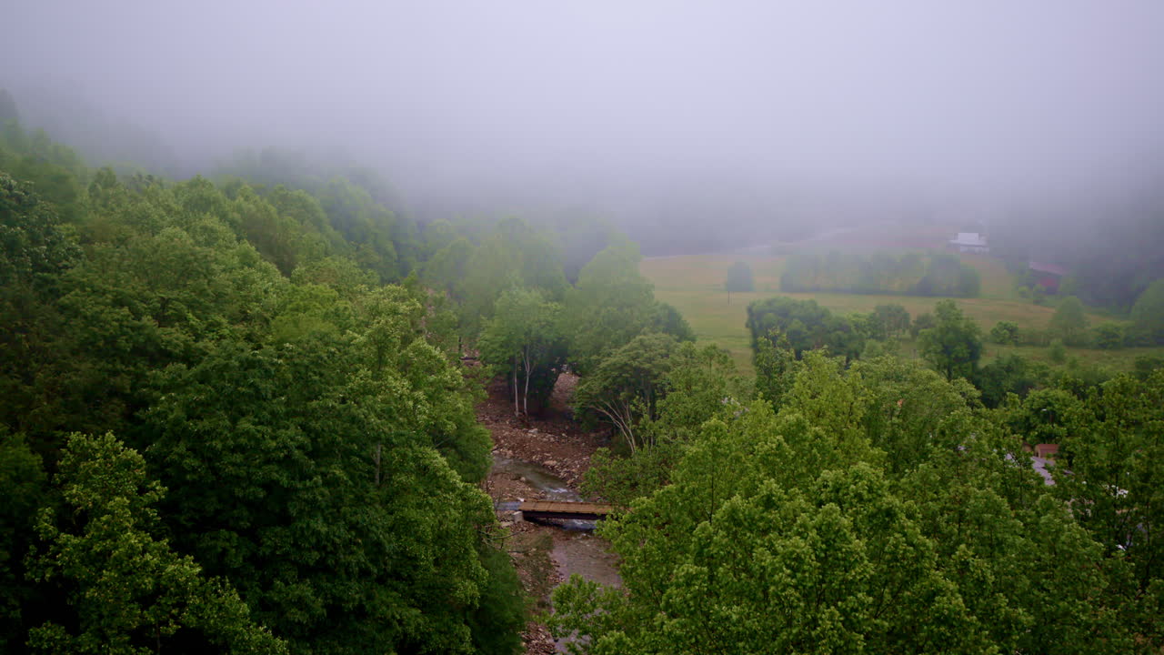 Vast, mist-veiled peaks of the Smoky Mountains unfold beneath the drone’s steady flight