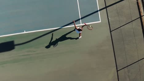 video of top view of african american female tennis player on court