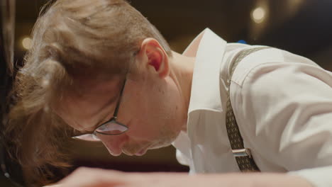 emotional piano player performing fast music