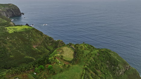 Maui-Hawaii-Aerial-v25-birds-eye-view-flyover-Lahoole-hillside-residential-capturing-Aawaiki-coastal-mountain-landscape,-picturesque-gulch-with-sheer-cliffs---Shot-with-Mavic-3-Cine---December-2022