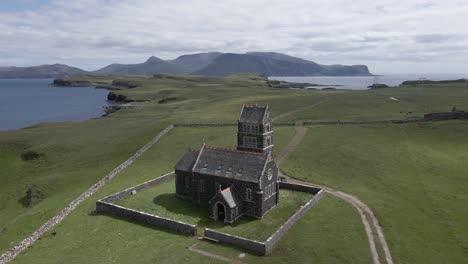 4k aerial drone footage surrounding st edwards church on sanday island near isle of canna scotland uk