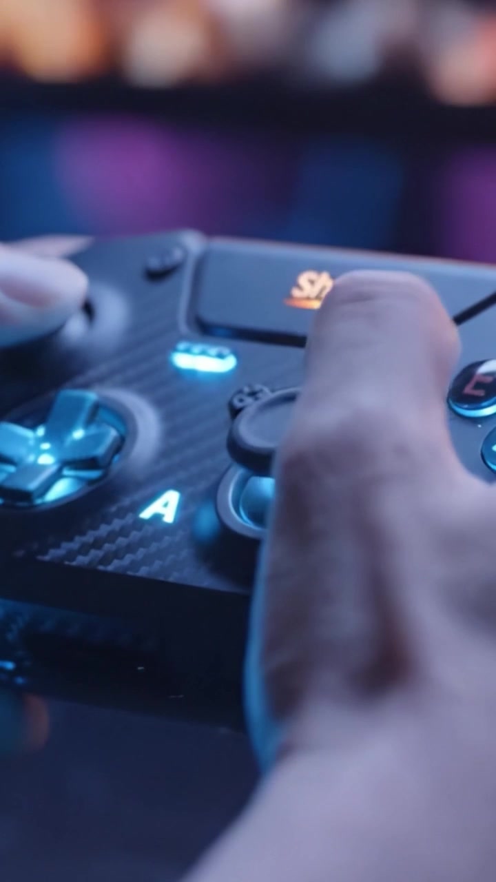 Engaged Gamer Utilizing a Controller with Emphasis on Buttons and Texture, Highlighting the Experience of Interactive Gameplay and Digital Entertainment