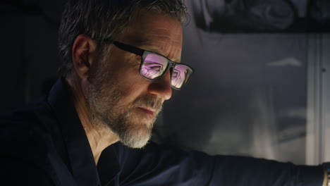 focused adult male in workplace setting