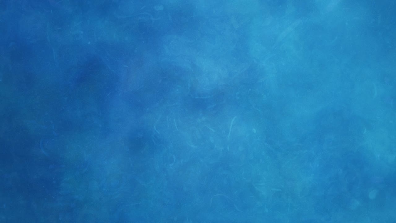 Ondulaciones turquesas en movimiento abstracto - Olas fluidas y patrones arremolinados en una dicha aguamarina, creando un fascinante fondo submarino azul