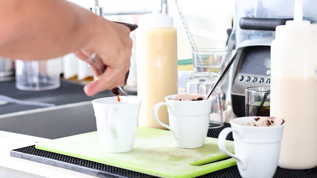 Sequential steps of making a hot chocolate.