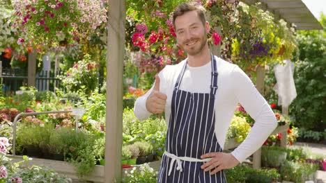 smiling handsome gardener man standing and posing