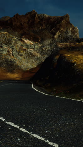 driving through dramatic mountain landscape