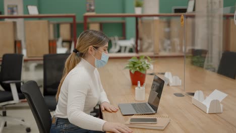 woman working in a modern co-working space