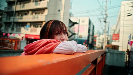 woman in a city contemplating life.