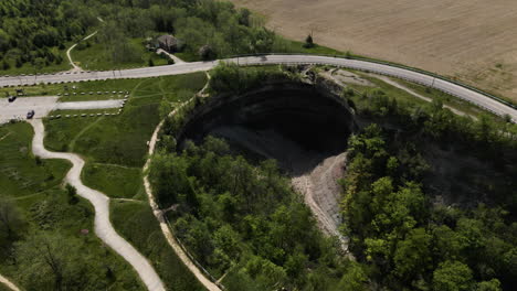 aerial shot showing devils punch bowl attraction during sunny day in stoney creek,canada