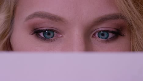 close-up of woman looking at a document