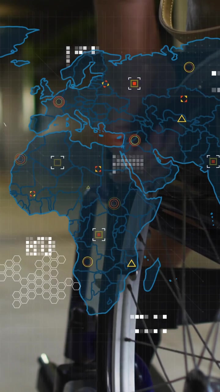 Animation of world map against low section of a disabled woman on wheelchair at office