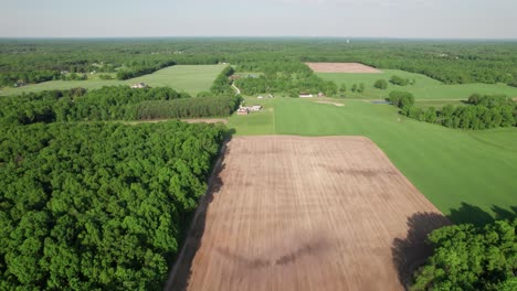 aerial view of agricultural field with different cultures and colors