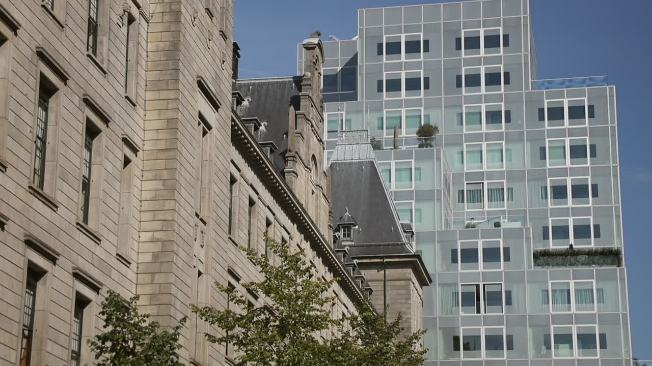 Facade of Timmerhuis Building and Stadhuis Building in the sun
