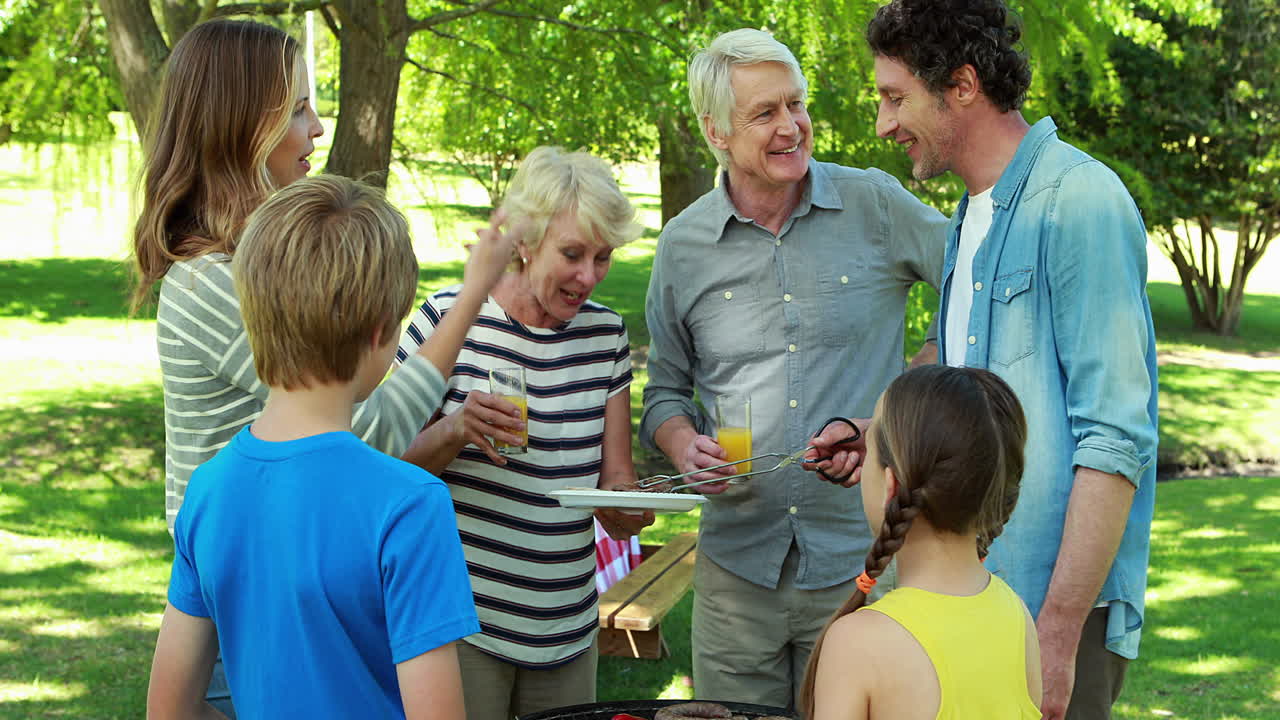 Family having a barbecue