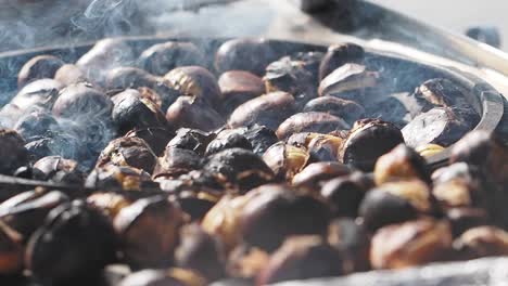 roasted chestnuts at a street food stall