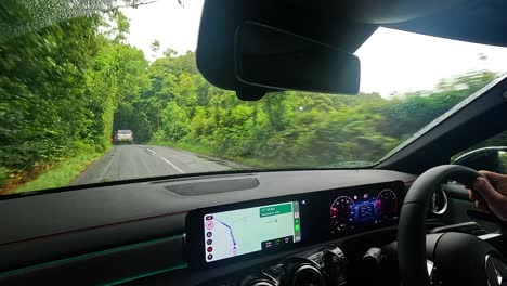 car journey through lush, green countryside