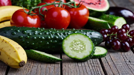assortment of fresh fruits and vegetables on a wooden table