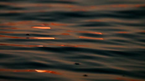 the light is reflected in the water, in the gold color