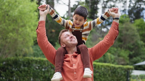 Father,-son-and-garden-on-shoulders-for-plane