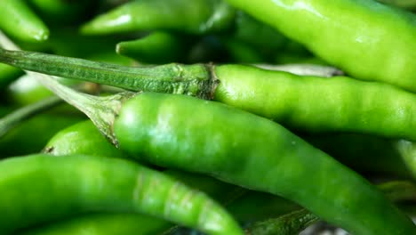 Close-up-of-green-chili-on-table-,