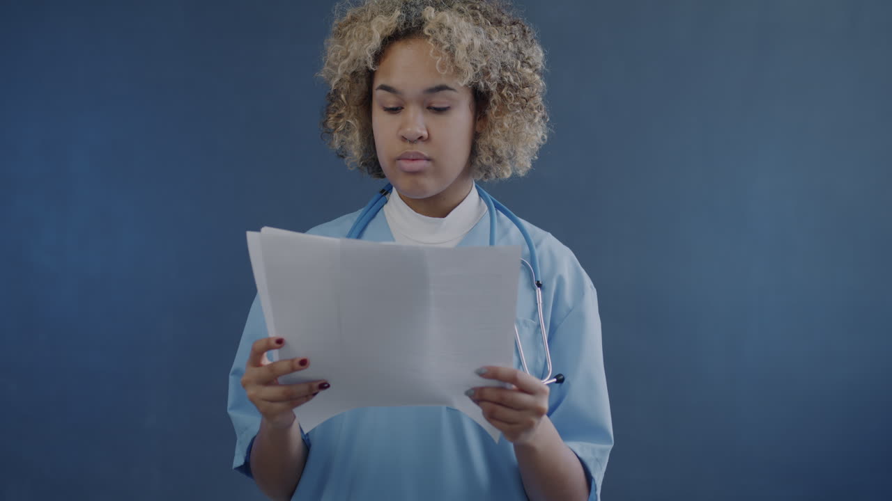 Doctor reviewing patient documents