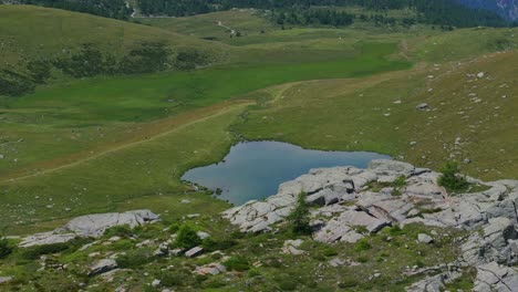 Pond-and-green-meadow-of-Valmalenco-mountains-in-northern-Italy