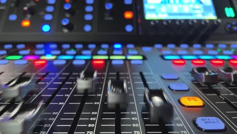 Detail-of-mixing-desk-or-concole-and-moving-volume-faders-in-slow-motion,-digital-or-automatic,-no-hands-or-fingers