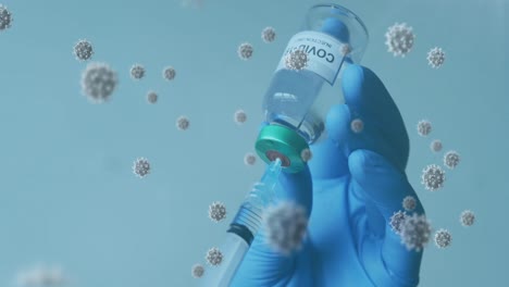 Animation-of-covid-19-cells-and-gloved-hands-filling-syringe-with-vaccine-from-vial