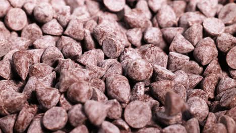 chocolate chips being poured and settling