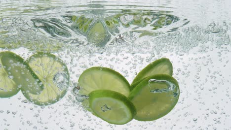 Lime-Slices-falling-deeply-under-water.-Shot-on-super-slow-motion-camera-1000-fps.