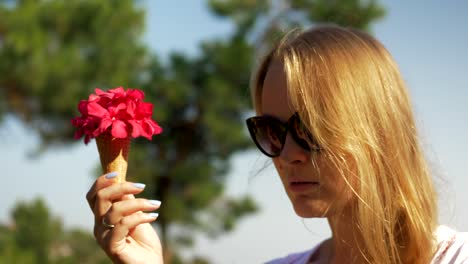 young woman with waffle cone  bouquet  outdo