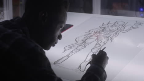 artist sketching a design
