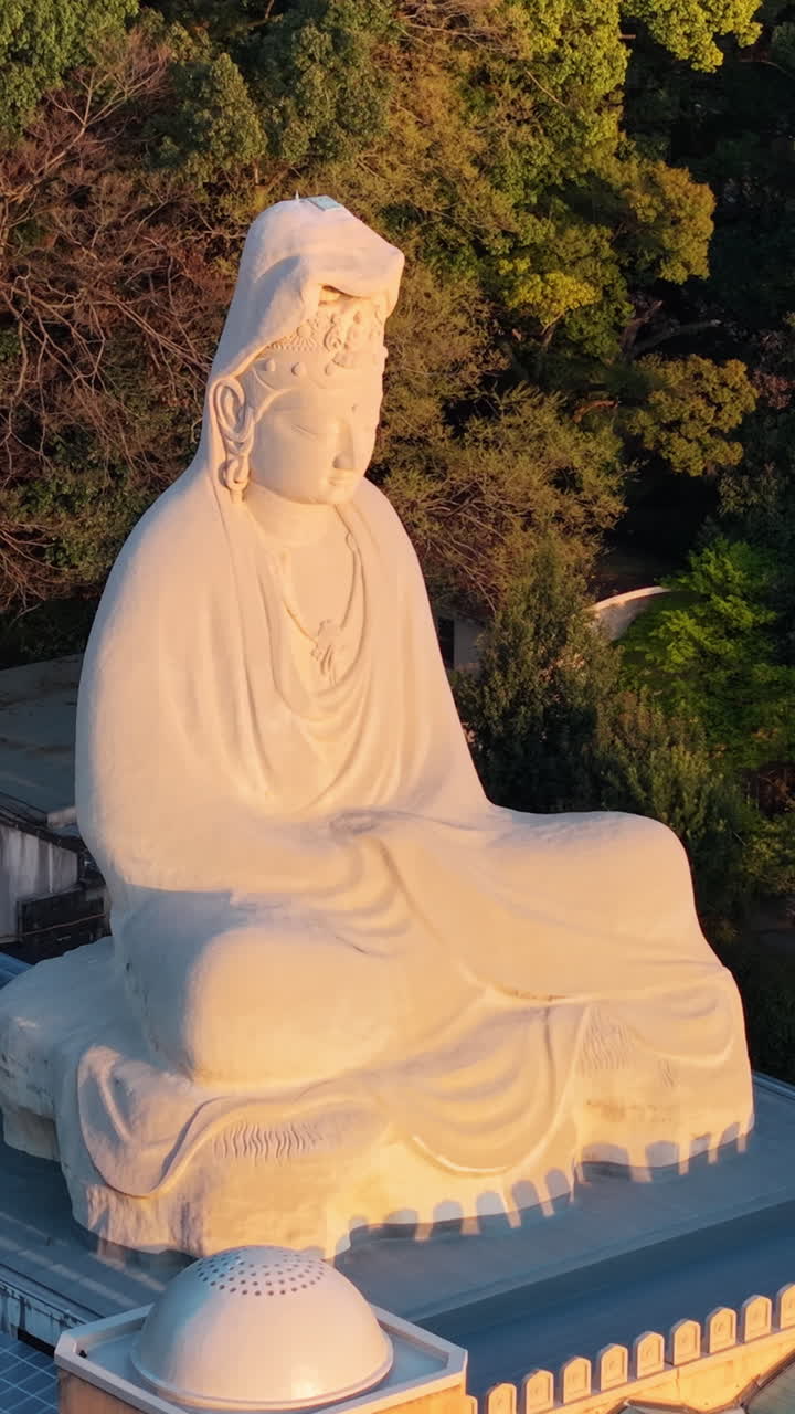 Aerial drone view of the Ryozen Kannon Temple in daylight in Kyoto, Japan