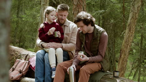 Family-having-picnic-at-the-forest