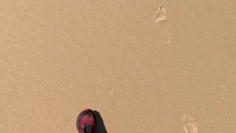 footsteps on sandy beach at nambucca heads