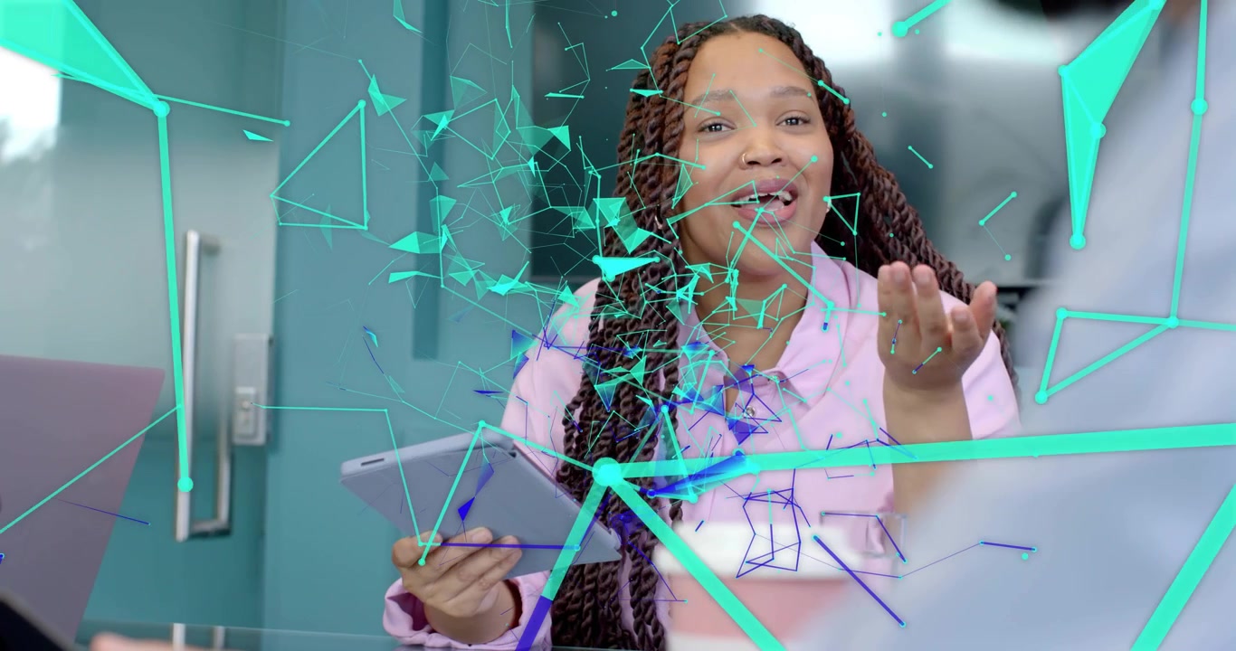 Woman with braids holding tablet and explaining to colleague in business while network drifting
