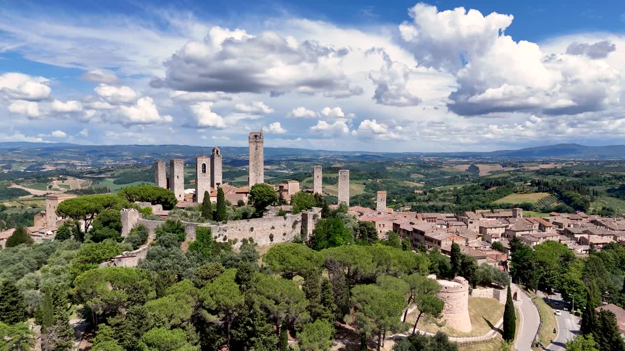 Italy, Tuscany, Val d'Elsa. Aerial view of the medieval village of San Gimignano. DJI_20240625153818