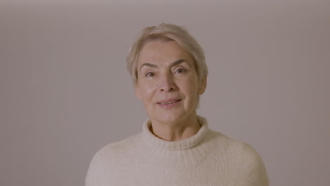 Portrait-Of-A-Senior-Woman-Smiling-At-Camera-2