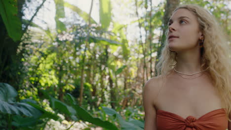 nature woman walking in forest enjoying natural beauty exploring lush tropical jungle alone 4k