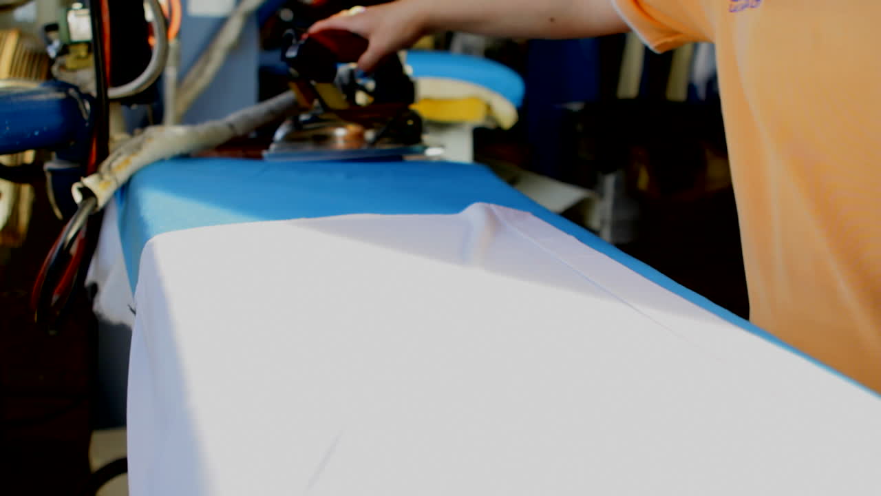 Ironing a white shirt