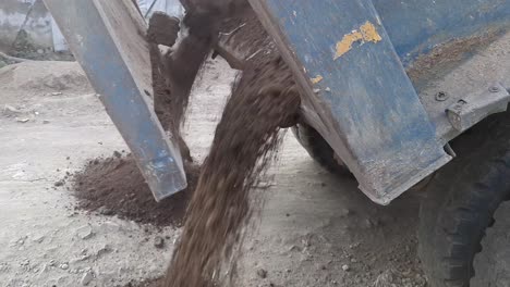 Dump-Truck-Unloads-Sand-in-Construction