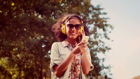 in high quality 4k format pretty hipster using smartphone