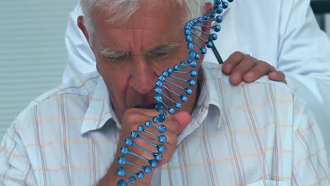 animation of dna strand spinning over female doctor using tablet