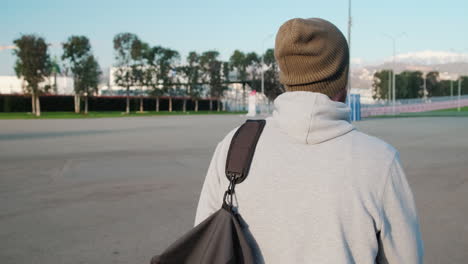 man walking in a park