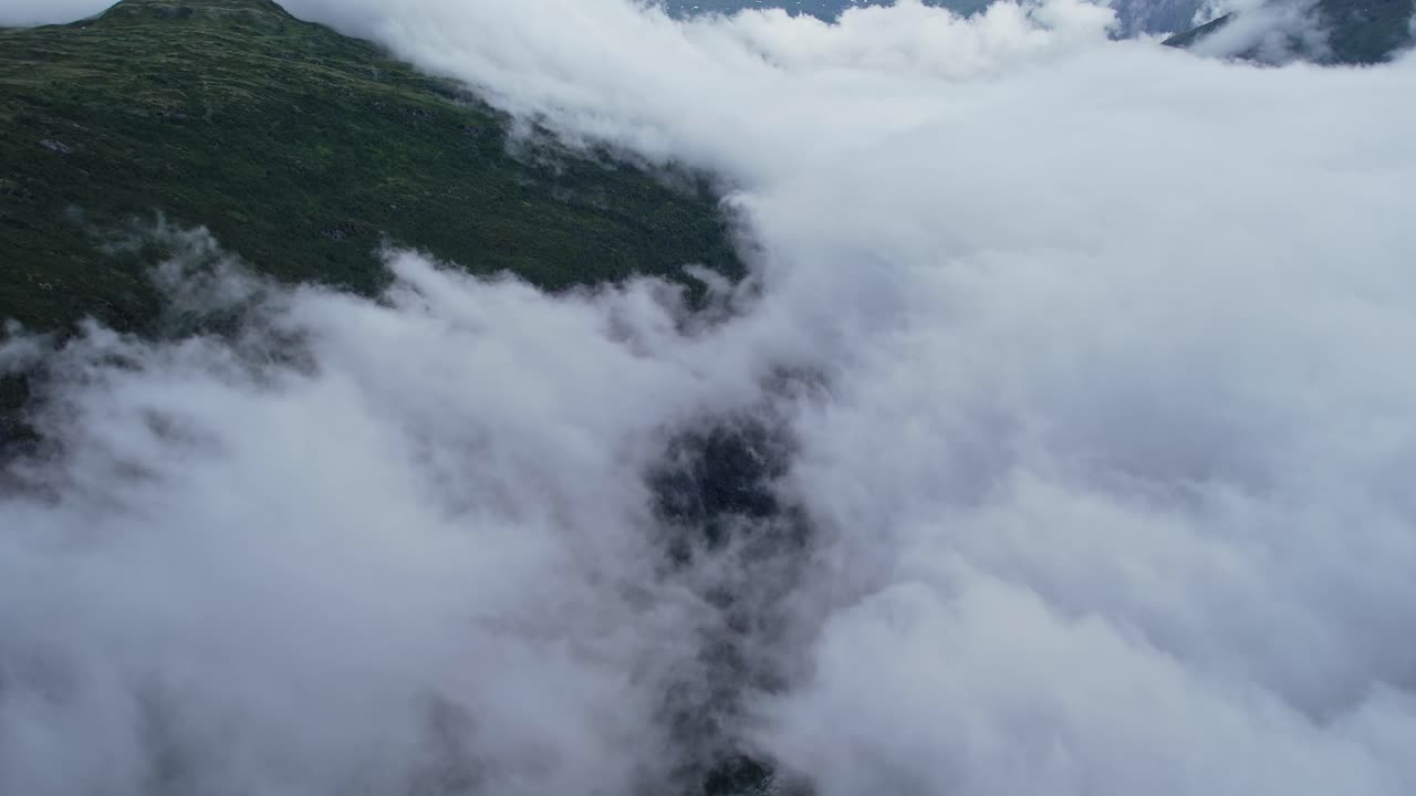 Stunning aerial view of cloud-covered mountains in Norway