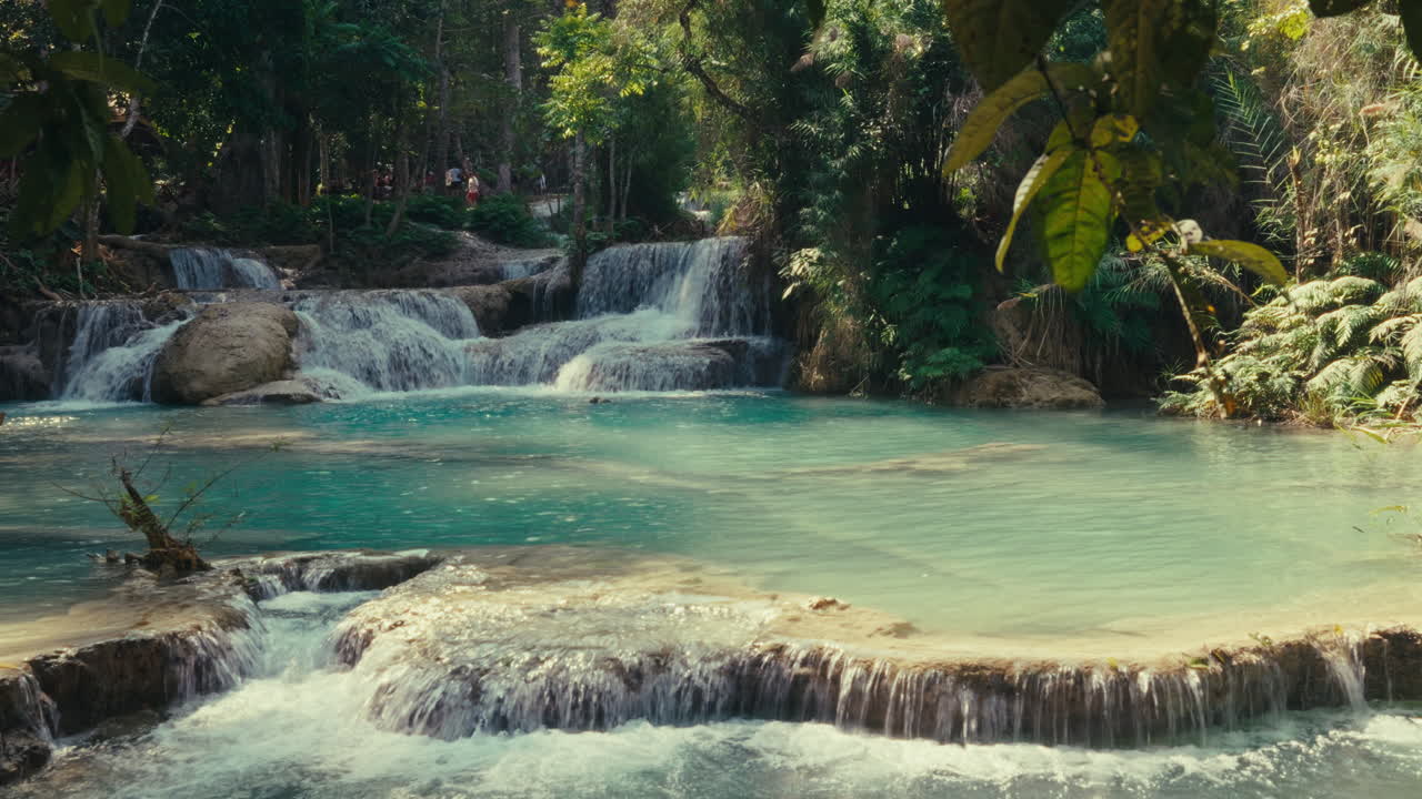 Beautiful Turquoise Waterfall in a Lush Tropical Forest