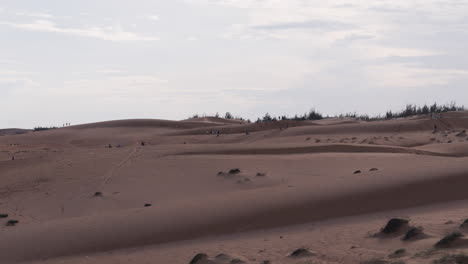 famous mui ne red sand dunes at overcast day