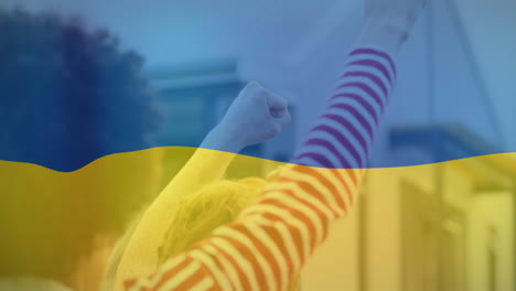 animation of flag of ukraine over back of african american male protester