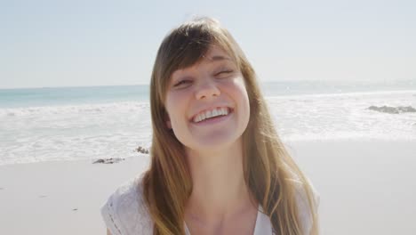young woman by the sea